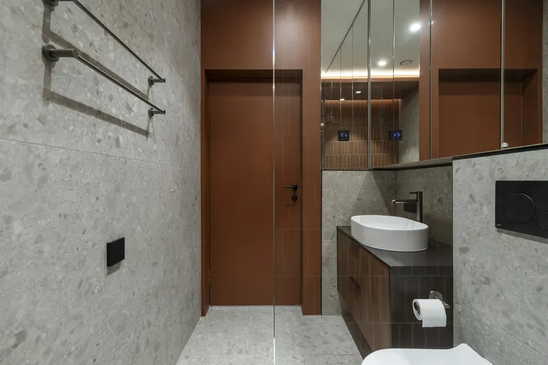 Bathroom with a stone-look floor